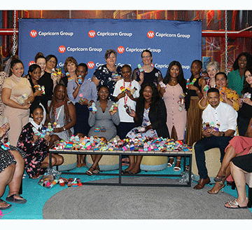 dolls Capricorn staff hand out 250 dolls