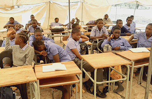 imbili Imbili struggles ahead in tent, shack