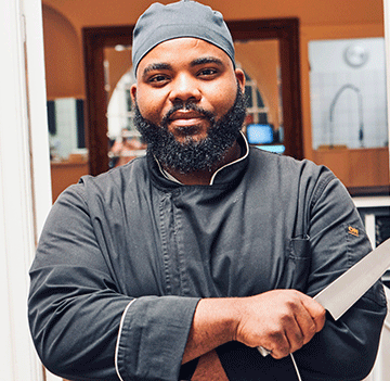 jov 3 Jovanko on stage, Chef Greyton in the kitchen