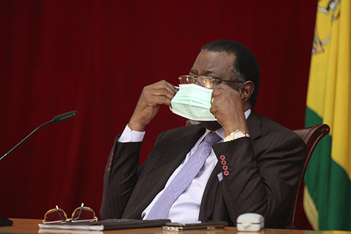 mask Govt rolls back Covid measures