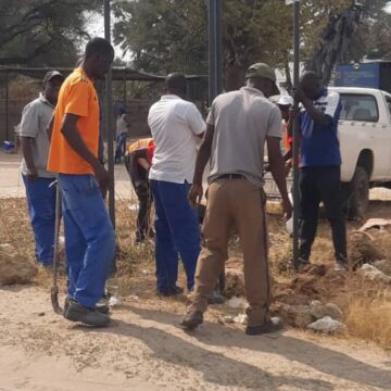 nkurenkuru Pupils assist disabled woman