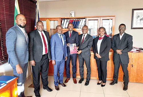 nwr staff posing shifeta urib and iipumbu NWR records N$46m profit