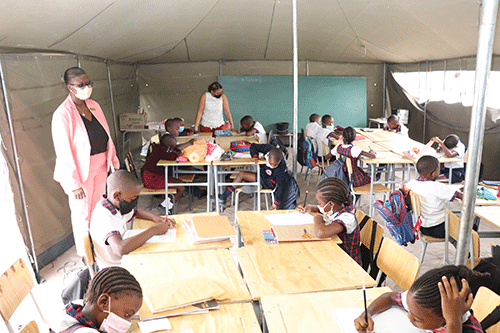placement Tents bolster Oshana classroom numbers