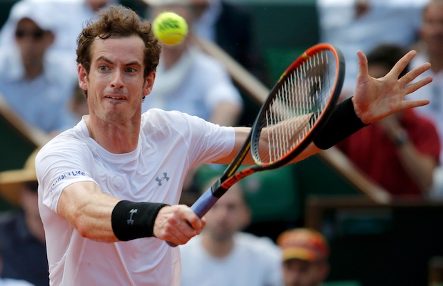Andy Murray of Britain returns the ball to Novak Djokovic of Serbia during their men's semi-final match at the French Open tennis tournament at the Roland Garros stadium in Paris Andy Murray withdraws from Olympics tennis singles
