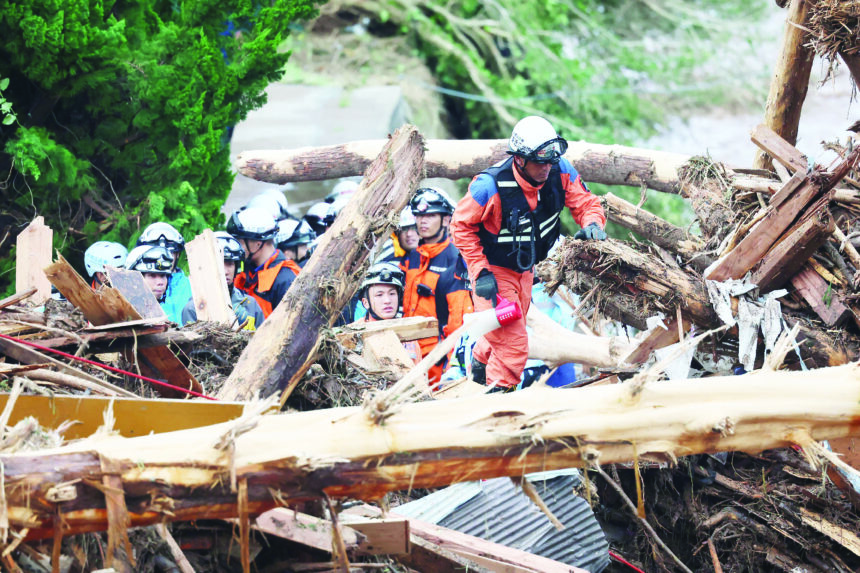 JAPAN-WEATHER-FLOOD Floods, landslides hit Japan months after major quake